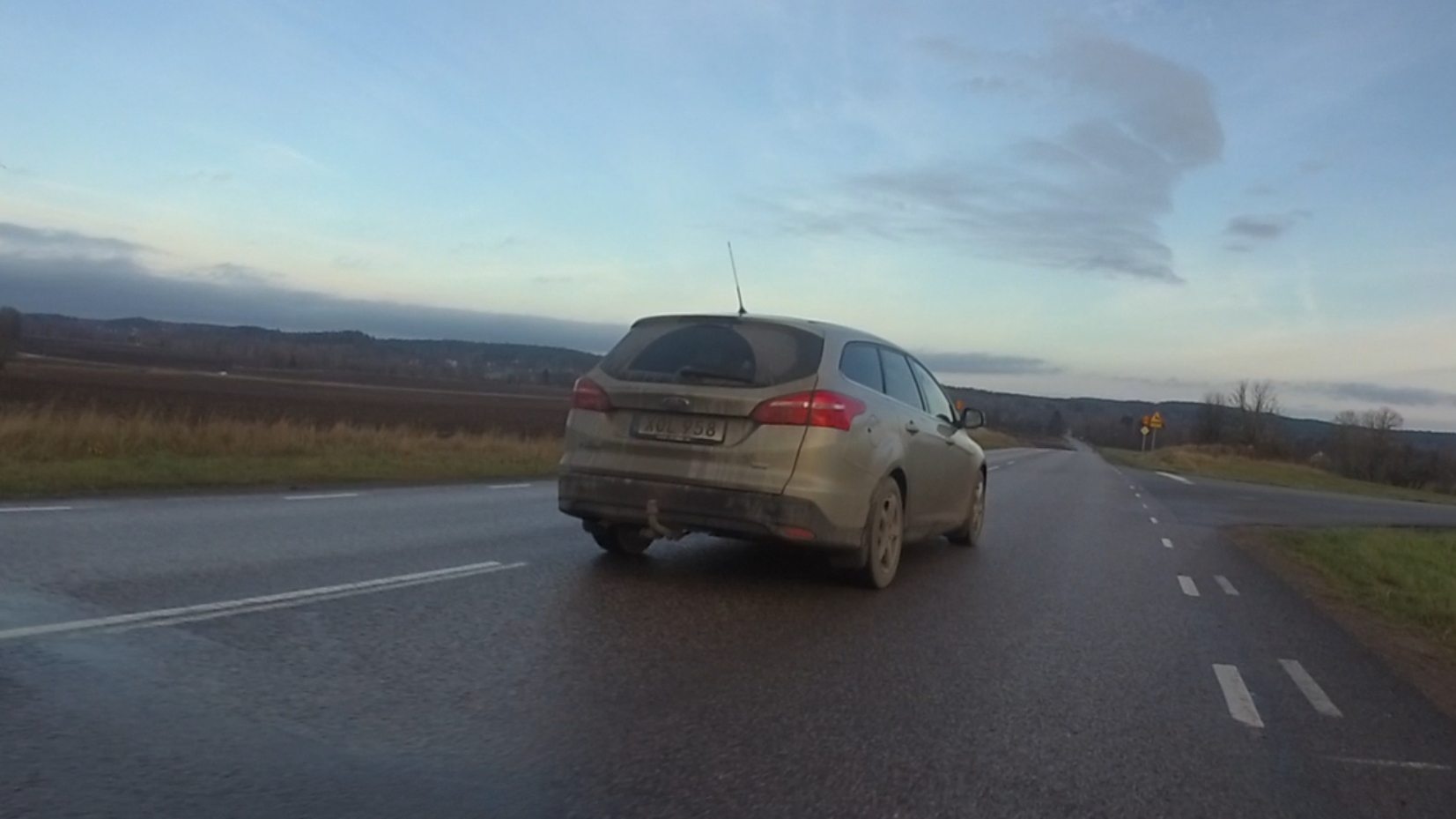 Car has just overtaken cyclist